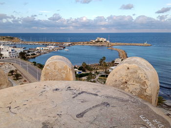 Scenic view of sea shore against sky