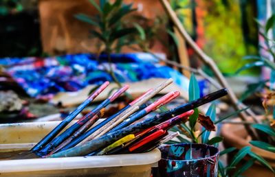 Close-up of paintbrushes on table