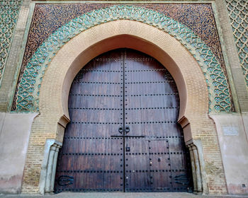 Low angle view of closed door of building