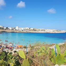 Scenic view of sea against blue sky