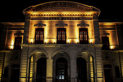 Low angle view of illuminated building