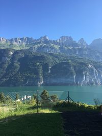 Scenic view of landscape and mountains against sky