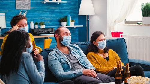 People sitting on sofa