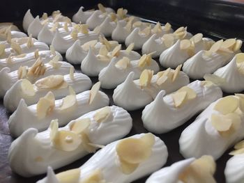 Close-up of white food arranged on table