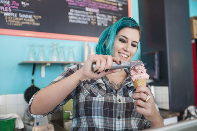 Young woman at ice cream shop.