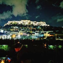 High angle view of illuminated buildings against sky