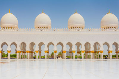 View of mosque against sky in city