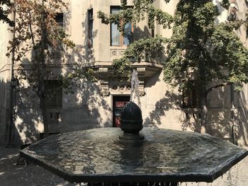 Fountain in front of building