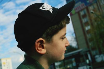 Portrait of young man looking away