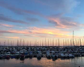 Boats moored at harbor