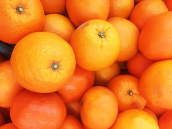 Full frame shot of oranges in market