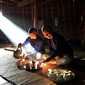 Women sitting and having tea