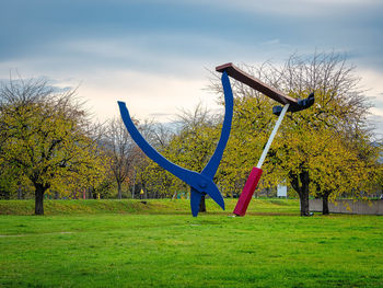 View of playground in park against sky