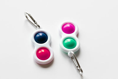 High angle view of objects on table against white background