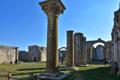 View of old ruins against clear sky