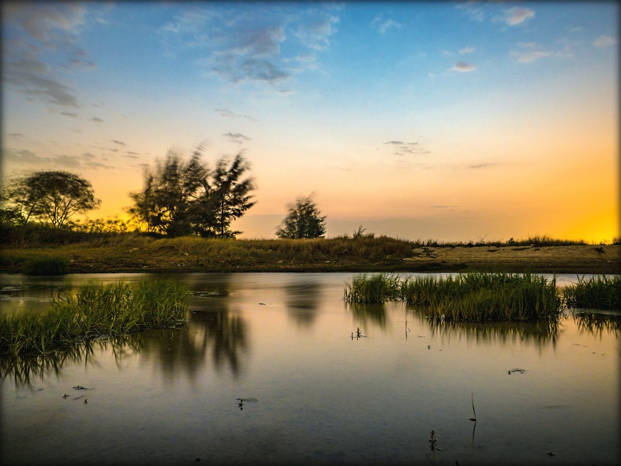 reflection, sunset, lake, water, tranquil scene, nature, tree, beauty in nature, scenics, sky, tranquility, no people, outdoors, silhouette, cloud - sky, day