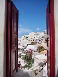 Buildings in city against sky