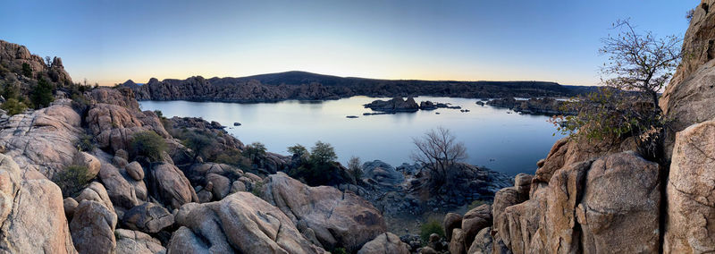 Panoramic view of bay against clear sky