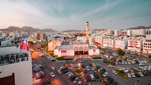 High angle view of buildings in city against sky