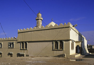 View of church against clear blue sky