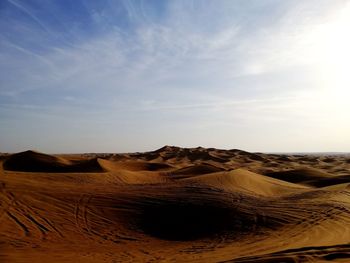 Scenic view of desert against sky