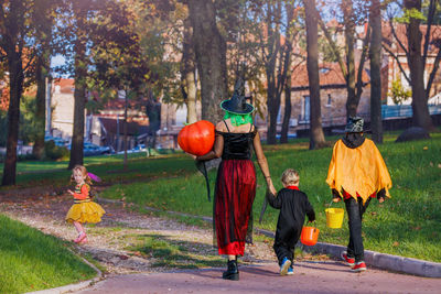 Rear view of people in park