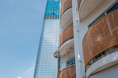 Low angle view of skyscraper against clear sky