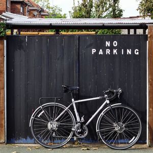 Bicycle parked on walkway