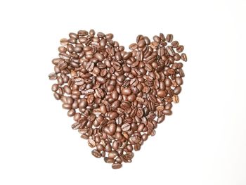 Close-up of heart shape over white background