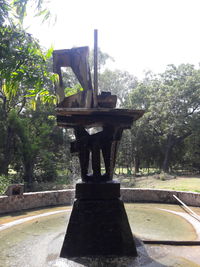 Gazebo in park against sky