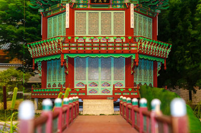 View of illuminated building at temple