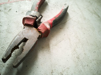 High angle view of work tools on floor