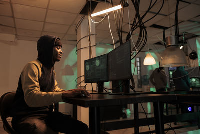 Young woman using laptop at home