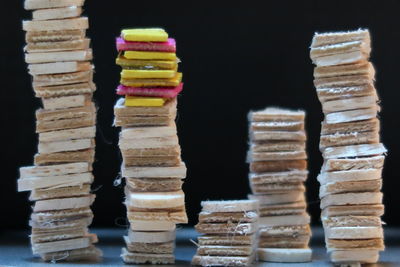 Stack of sweet food on table