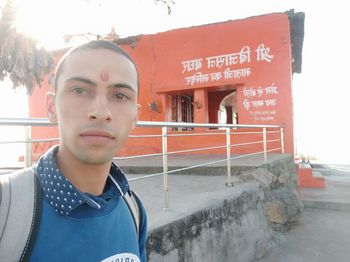 Portrait of young man looking away