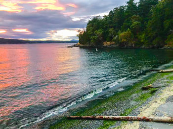 Scenic view of sea against sky during sunset