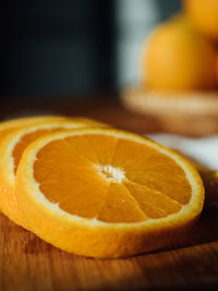 Close-up of orange slice on table