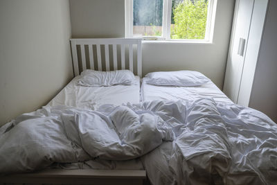 Close-up of messy bed