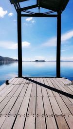 Pier over sea against sky