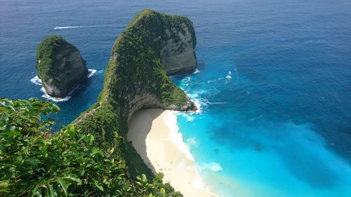 High angle view of rocks in sea