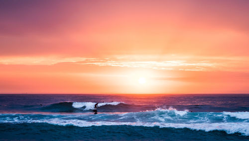 Scenic view of sea against sky during sunset