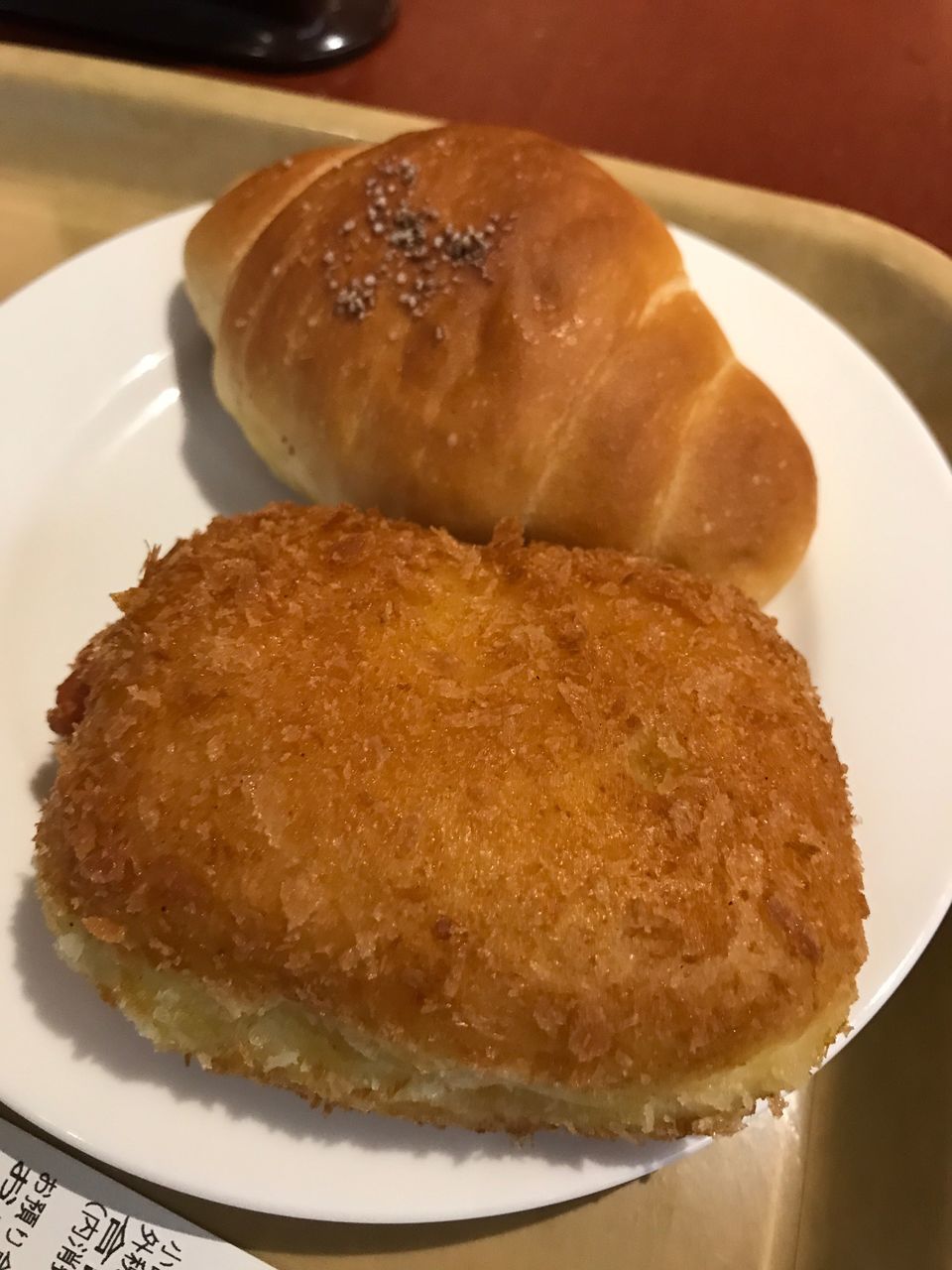 plate, food and drink, food, ready-to-eat, freshness, still life, close-up, indoors, no people, bread, serving size, unhealthy eating, high angle view, table, snack, indulgence, bun, meal, fried, stuffed, temptation, breakfast, french food, crockery