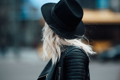 Rear view of woman wearing hat