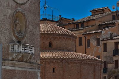 Exterior of old building against sky in city