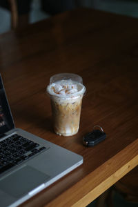 High angle view of coffee cup on table