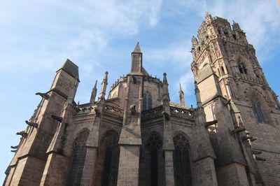 Low angle view of rodez cathedral against sky