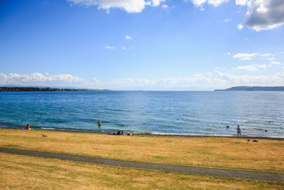 Scenic view of sea against blue sky