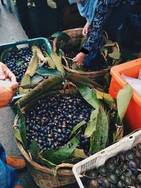 High angle view of man preparing food at market stall