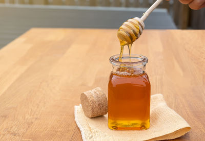 Close-up of drink in jar on table
