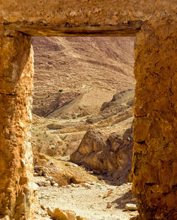 Desert seen through rock formation